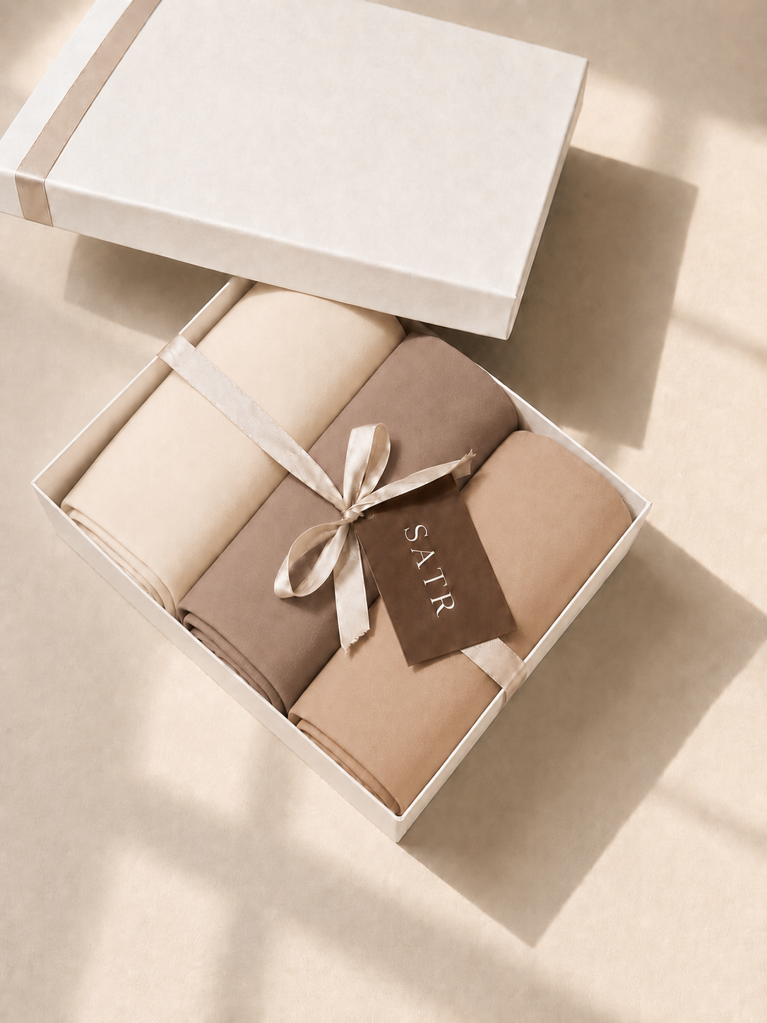 SATR Light Neutrals Trio gift box — three folded chiffon hijabs in cream, taupe and camel